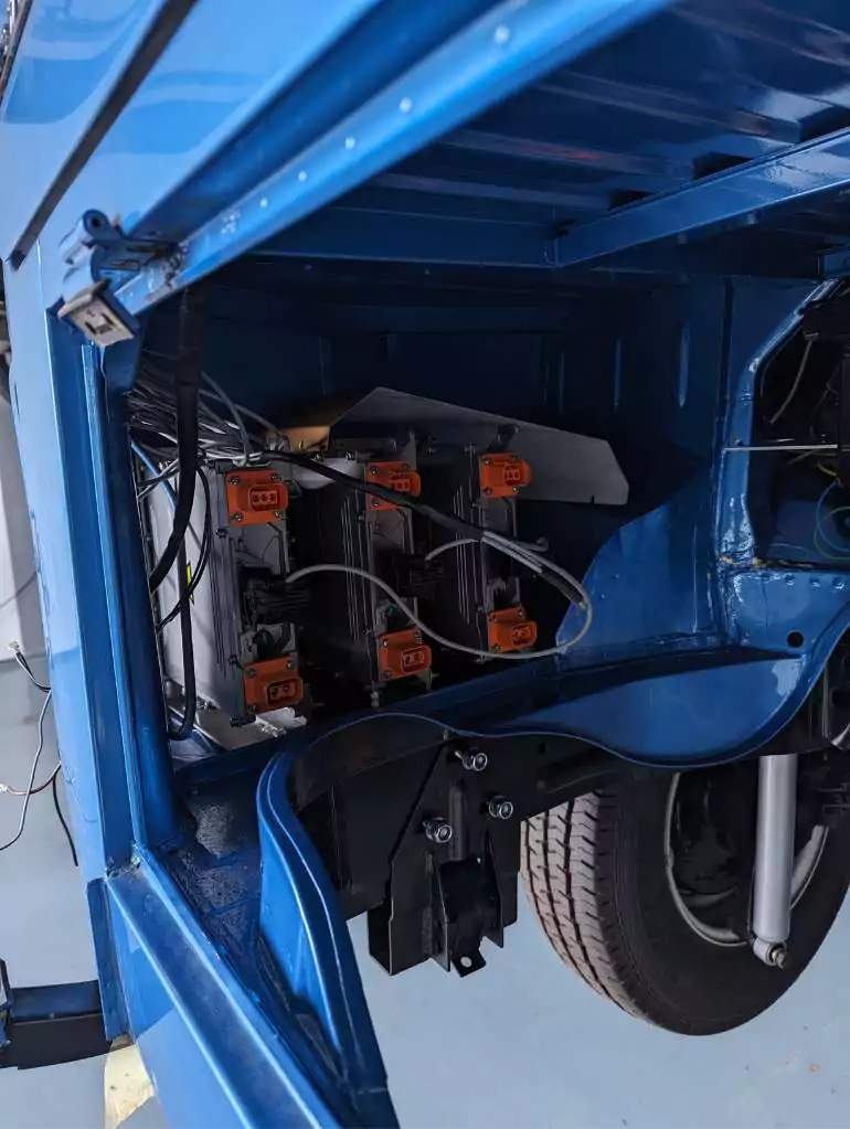 electric components installes in a blue volkswagen van